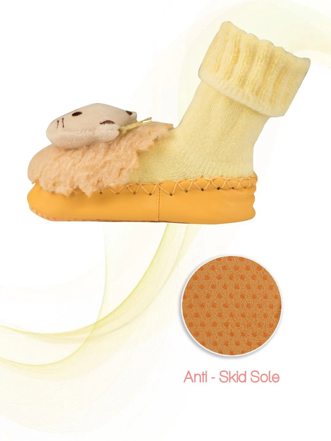 Soft and Playful Yellow Leather Socks with Crowned Lion Design for Boys